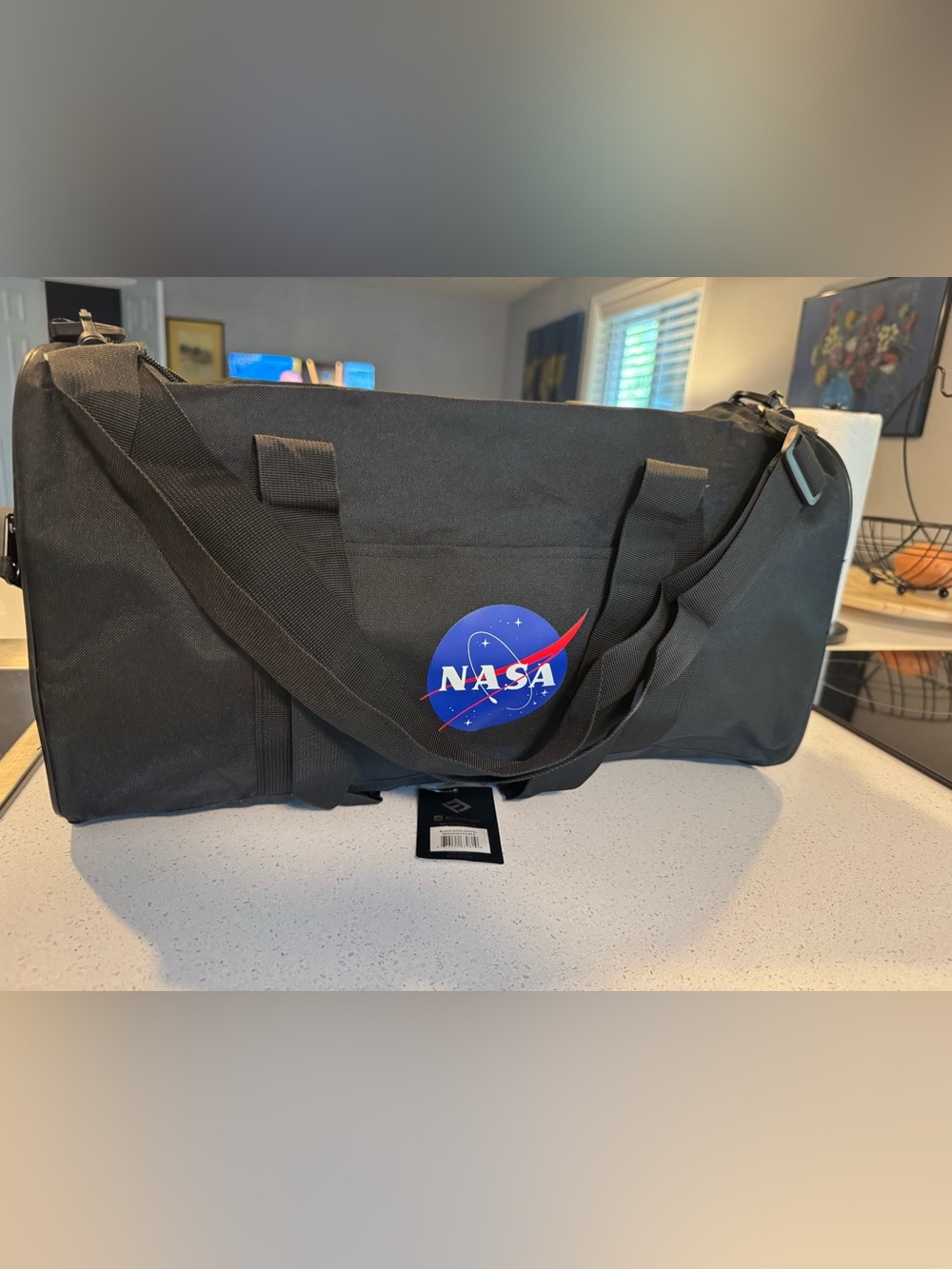 NASA Black Utility Duffel Bag; Free Keychain with Purchase.